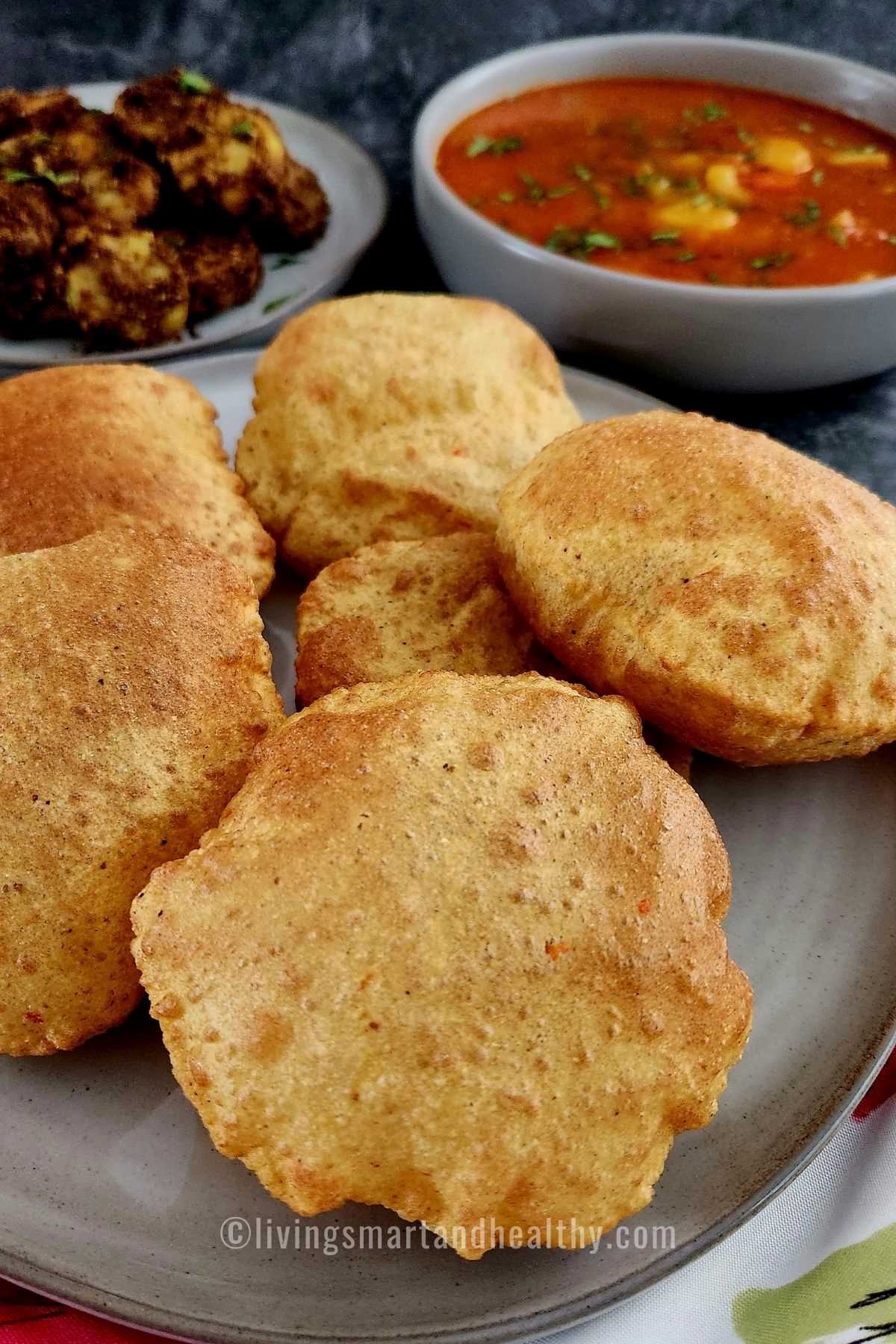 crispy bedmi puri served piping hot with aloo sabzi on the side