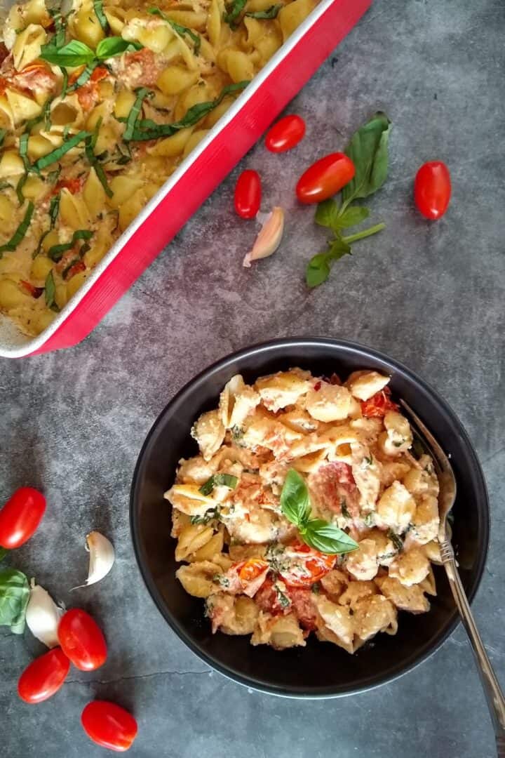 baked feta pasta recipes in a black serving bowl
