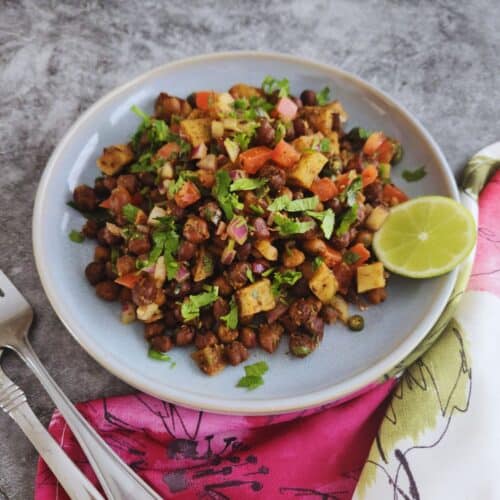 warm kala chana chaat served with a squeeze of fresh lemon juice