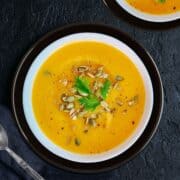 instant pot butternut squash soup served in a white bowl