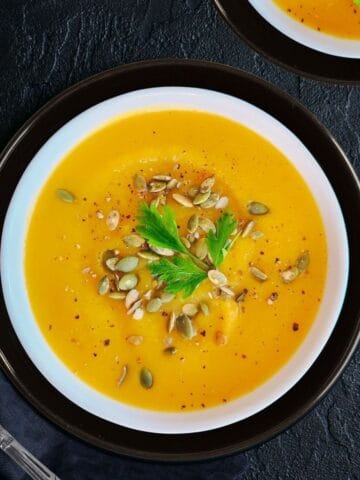 instant pot butternut squash soup served in a white bowl