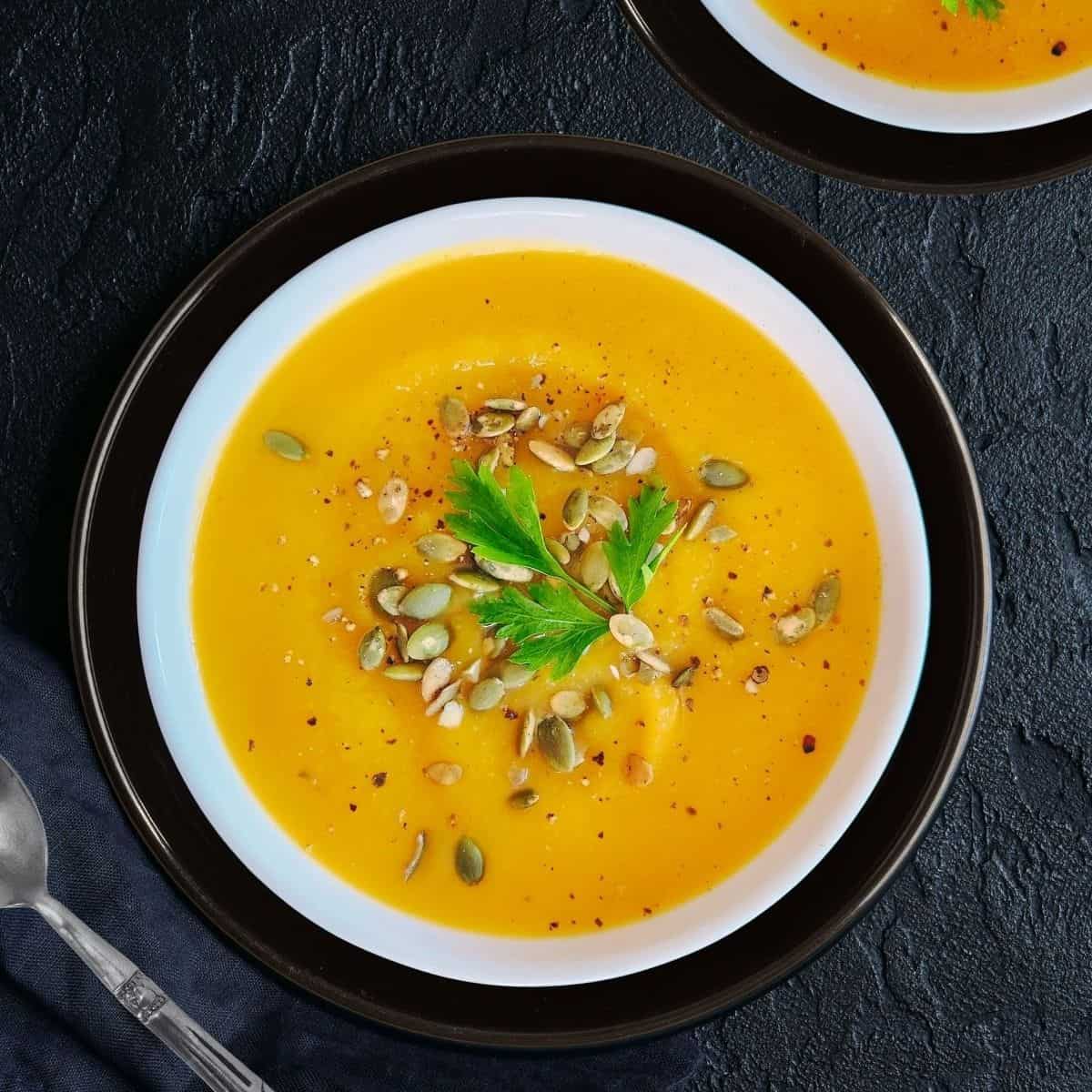 instant pot butternut squash soup served in a white bowl