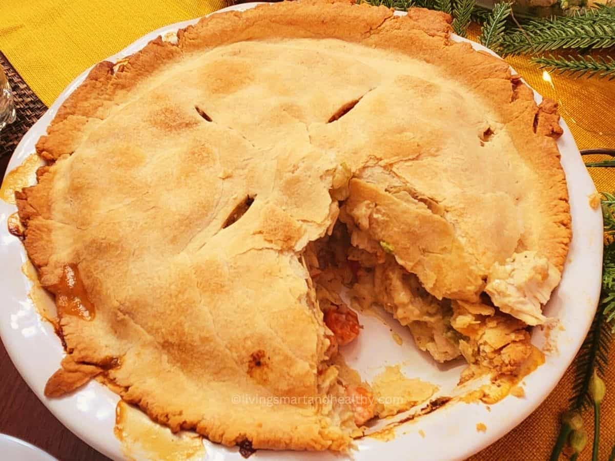 Rustic chicken pot pie with flaky pastry and hearty filling.
