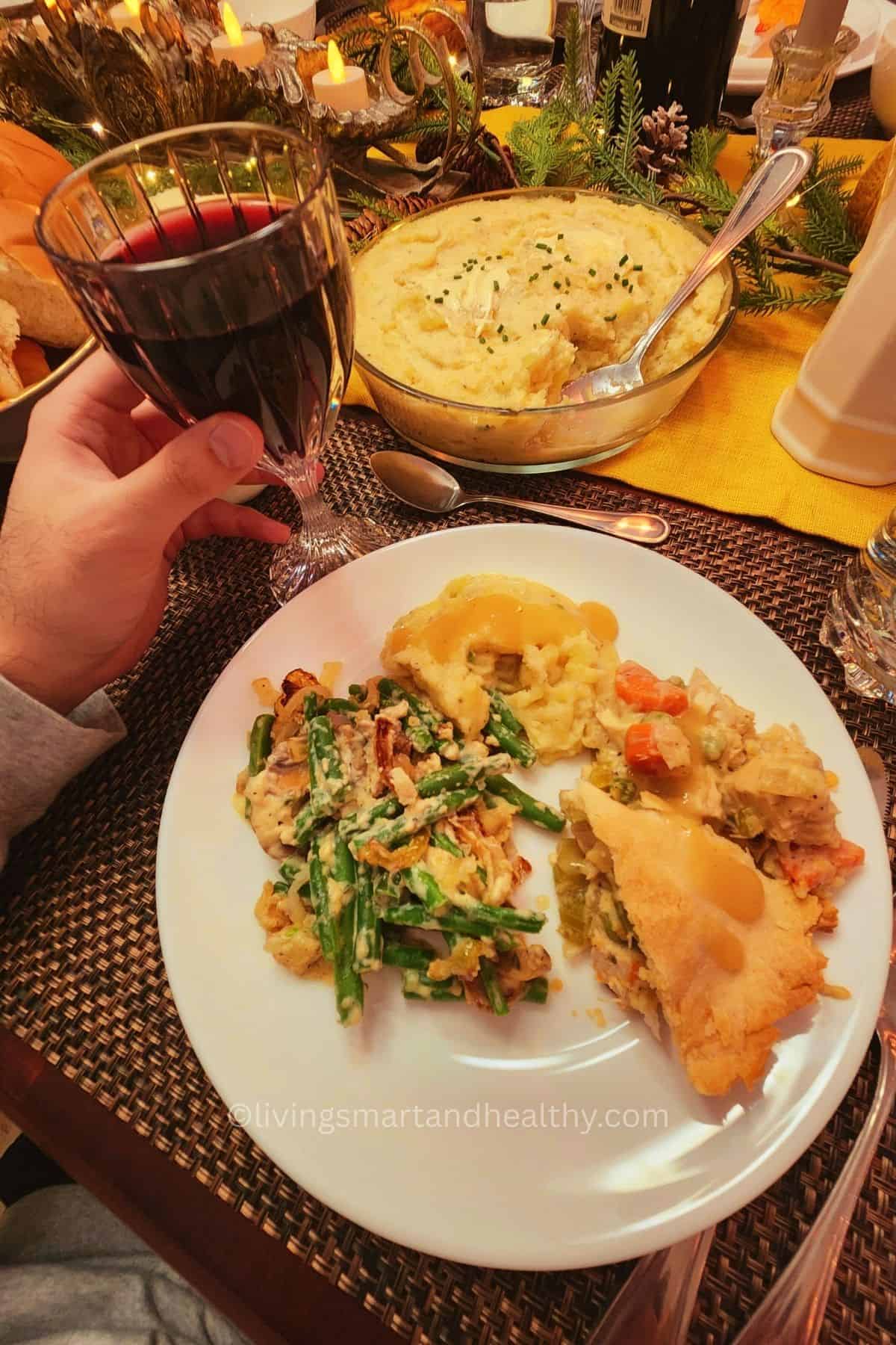 Slice of chicken pot pie served on a plate with steam rising.
