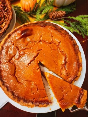 Classic pumpkin pie on a rustic table, perfect Thanksgiving dessert using Libby’s pumpkin pie recipe.