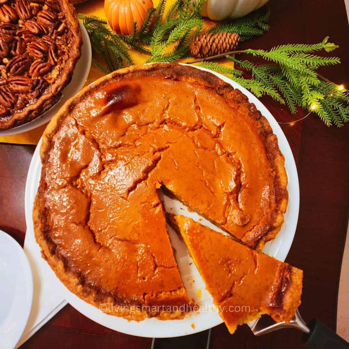 Classic pumpkin pie on a rustic table, perfect Thanksgiving dessert using Libbyโs pumpkin pie recipe.