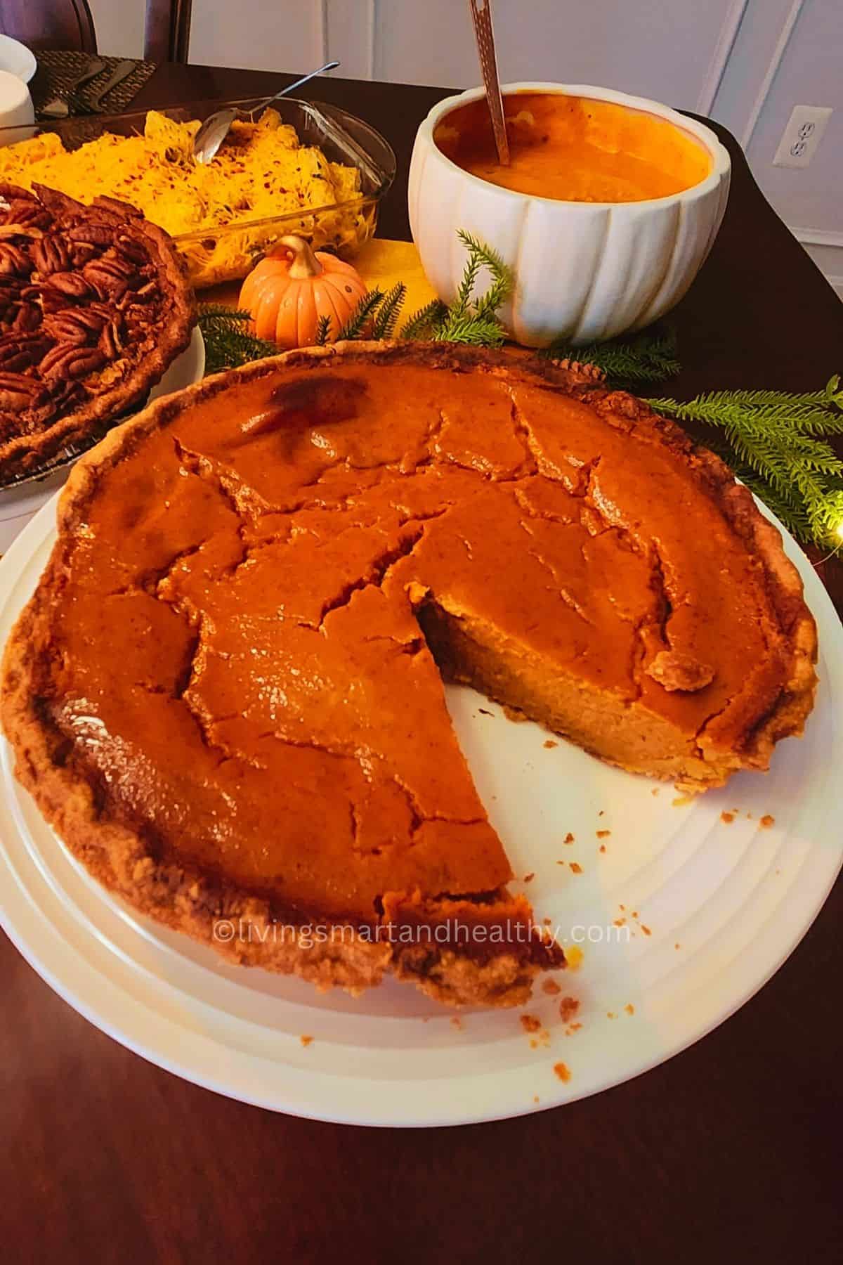 Golden-baked Libby’s pumpkin pie served in a pie dish, iconic pumpkin pie recipe for holiday gatherings.