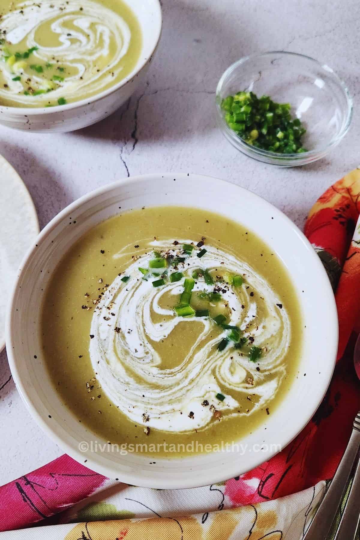 High protein keto-friendly creamy celery soup garnished with chives