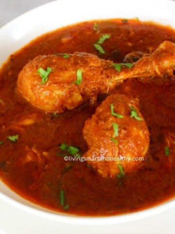 easy chicken curry indian served in a white bowl