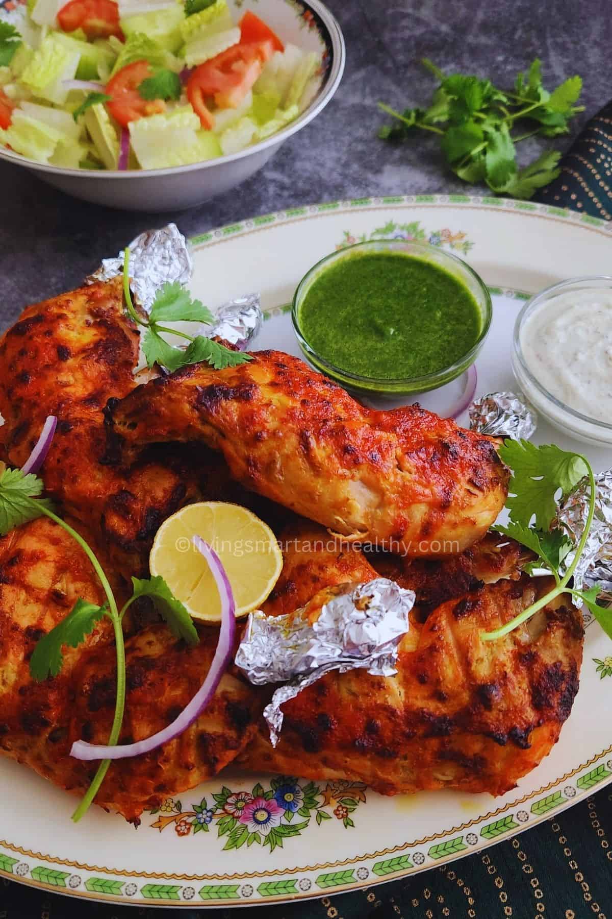 Close-up of charred tandoori chicken made in the oven