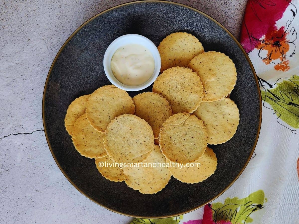 Healthy gluten-free almond flour crackers ready to serve with cheese and dips