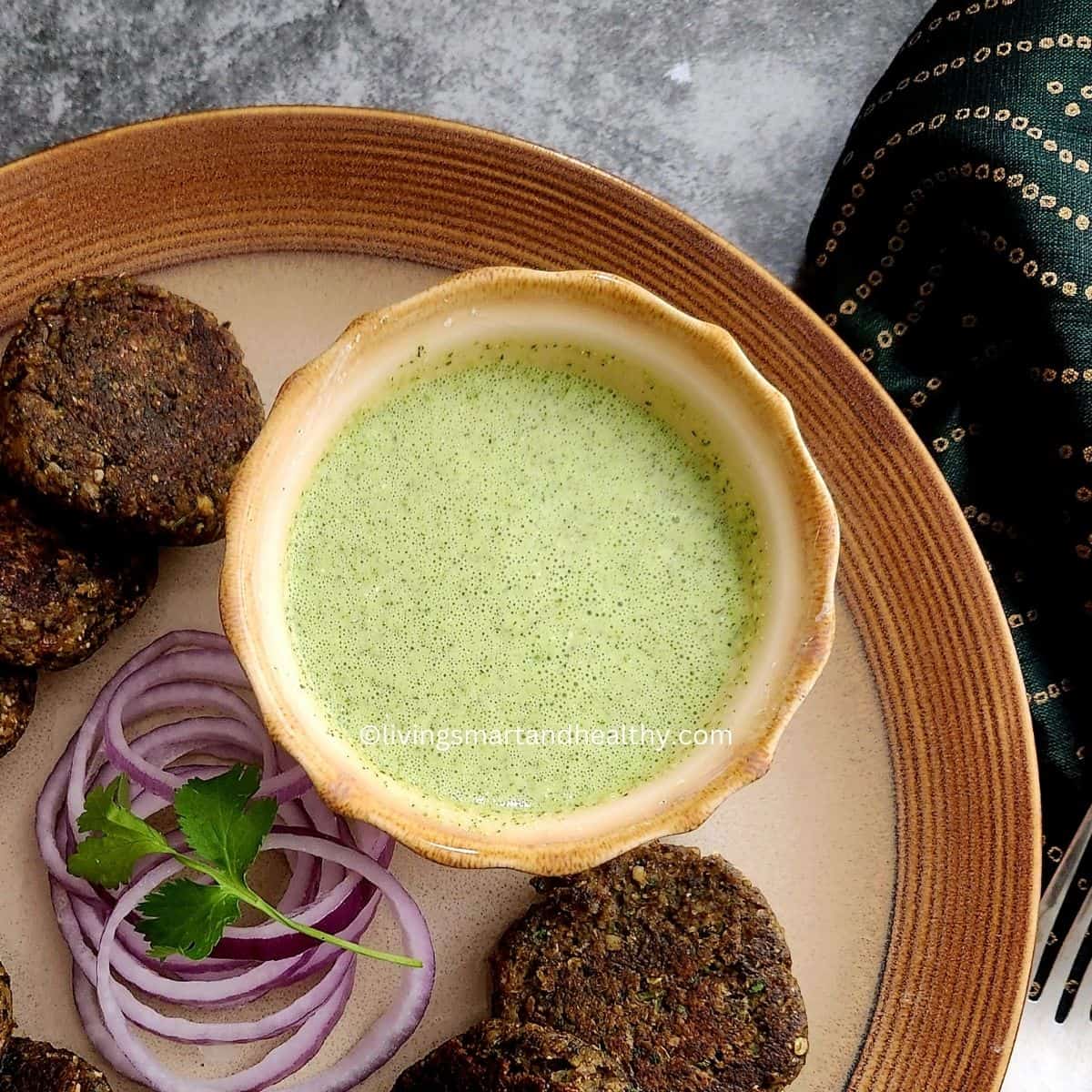 mint yogurt sauce served with mushroom galouti kebab