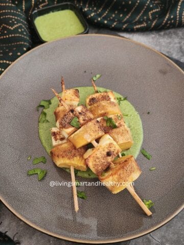 Crispy paneer and sweet potato skewers served with vrat green chutney