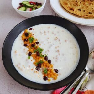 Close-up of dahi boondi raita with soft boondi in spiced yogurt
