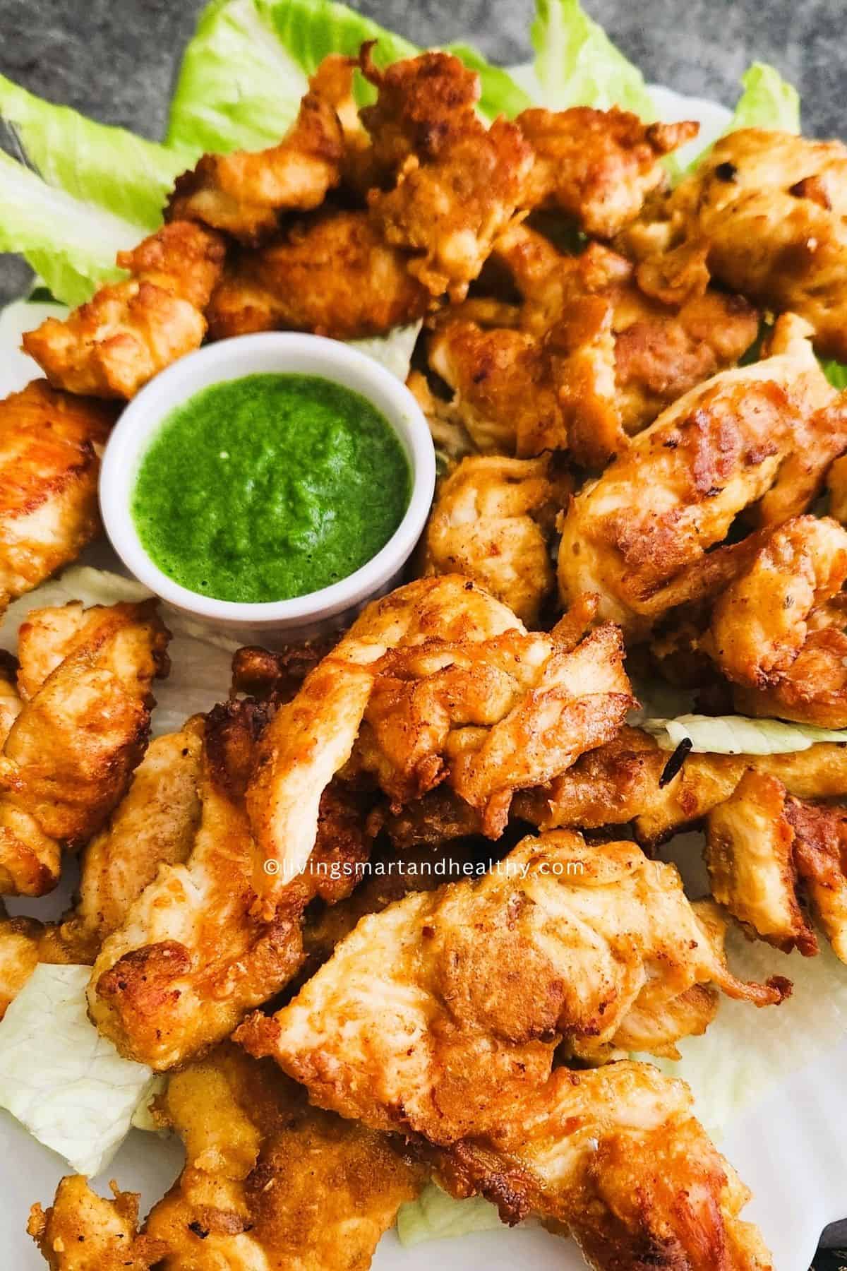Close-up of juicy no deep fried chicken pakoda with crispy texture