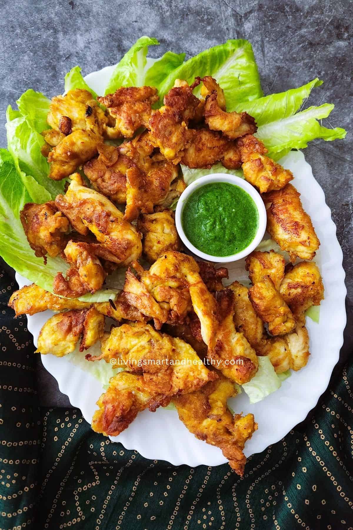 Indian chicken pakora appetizer on serving platter