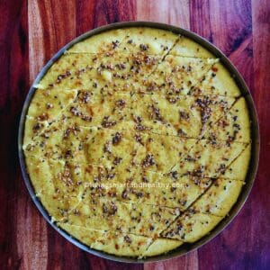 Soft and fluffy dalia dhokla with tempering on top