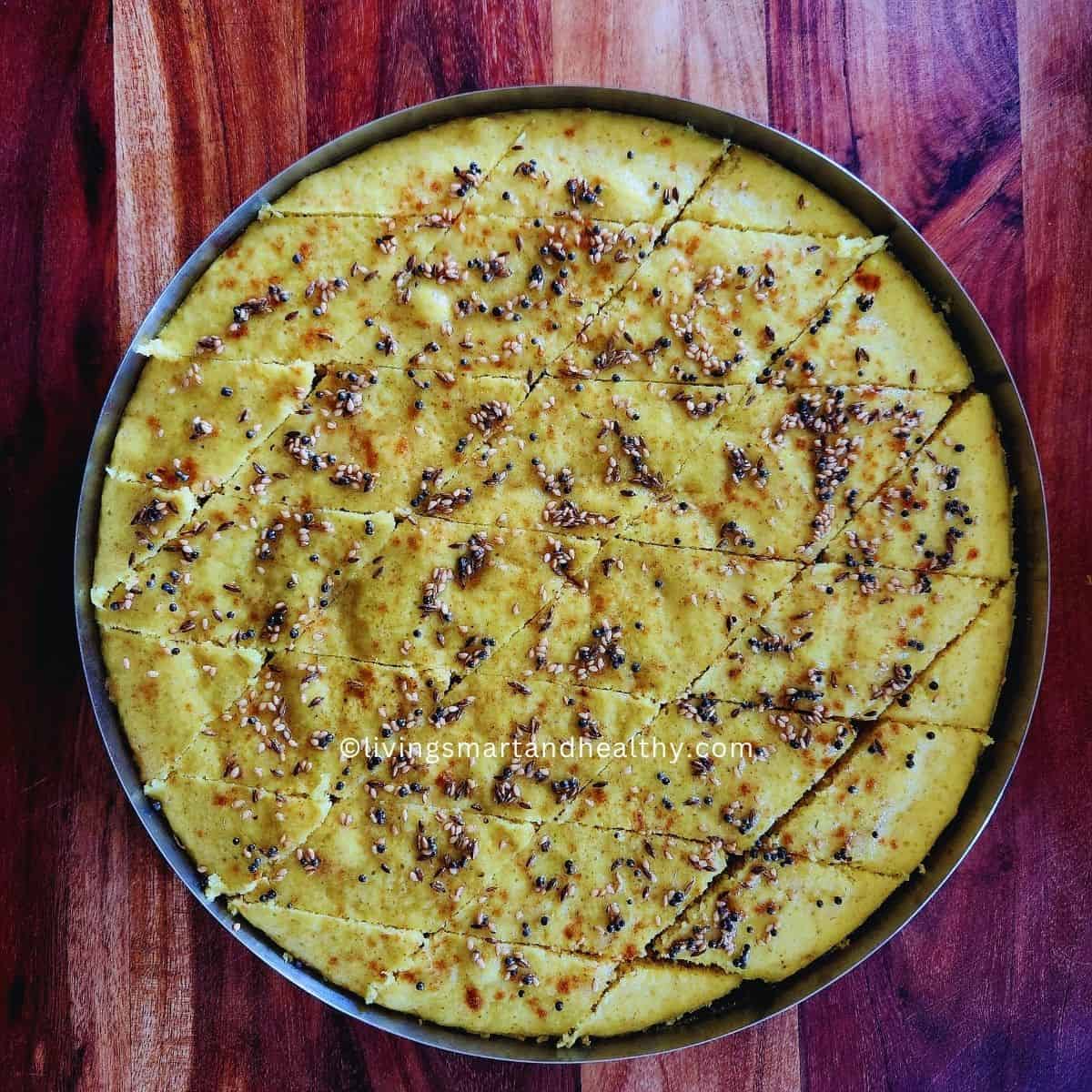 Soft and fluffy dalia dhokla with tempering on top