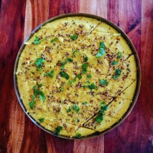 instant dalia dhokla garnished with coriander