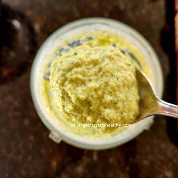 grind paneer moong dal idli batter to a course sooji like texture