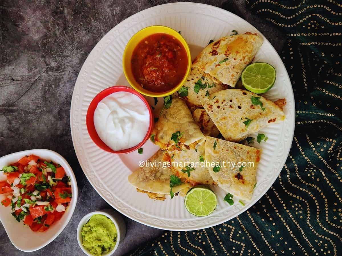 Roasted poblano chicken quesadilla made with almond flour tortilla, sliced and served hot