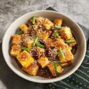 Golden pan-fried tofu coated in a sticky sweet-savory homemade teriyaki sauce. Ready in 30 minutes with simple pantry ingredients