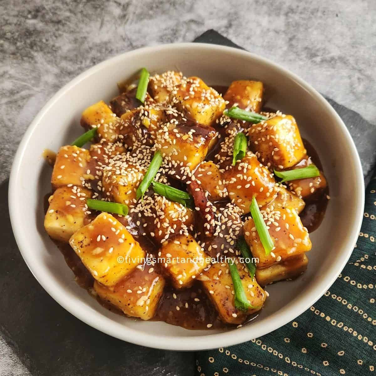 Golden pan-fried tofu coated in a sticky sweet-savory homemade teriyaki sauce. Ready in 30 minutes with simple pantry ingredients