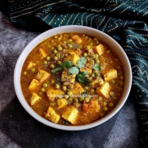 vegan matar paneer with tofu garnished with kasuri methi and fresh cilantro