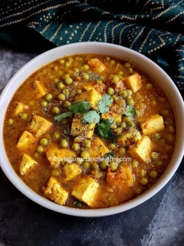 vegan matar paneer with tofu garnished with kasuri methi and fresh cilantro