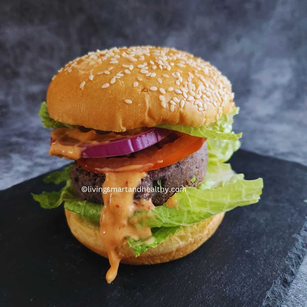 Black bean burger patties in air fryer basket