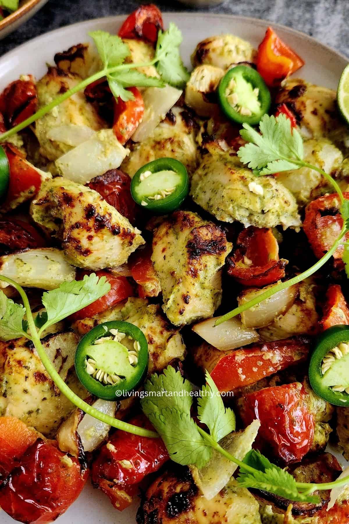 Juicy hariyali chicken tikka kebab with lightly charred edges fresh out of the air fryer