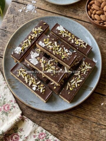 1. Close-up of creamy cardamom burfi bars with chocolate ganache.