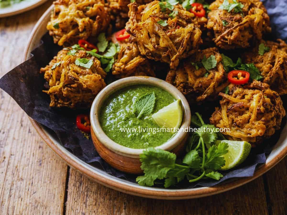 Golden Indian onion fritters served with fresh green chutney.
